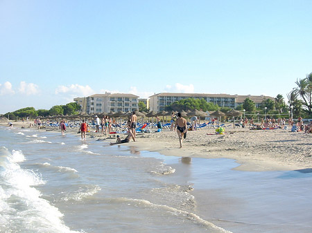 Foto Touristen am Strand